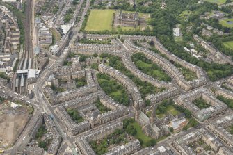 Oblique aerial view of the Western New Town, Palmerston Place, Walpole Hall, Easter Coates House and St Mary's Episcopal Church, looking WSW.
