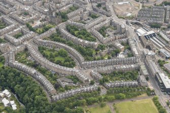 Oblique aerial view of Palmerston Place, Glencairn Crescent, Lansdowne Crescent, Grosvenor Crsecent, Douglas Crescent and Eglinton Crescent, looking ESE.