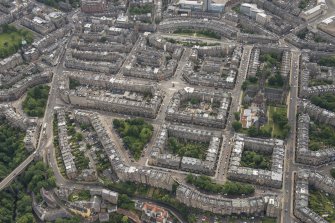 Oblique aerial view of Melville Street, Palmerston Place, Atholl Crescent, Coates Crescent and Shandwick Place, looking SE.