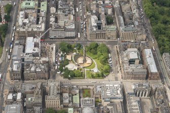 Oblique aerial view of South St Andrew Street, Princes Street, the Scottish National Portrait Gallery and St Andrew Square, looking WSW.