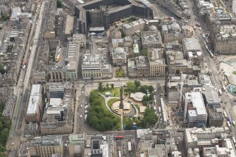 Oblique aerial view of the Scottish National Portrait Gallery, York Place, Dundas House and St Andrew Square, looking E.