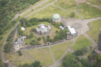 Oblique aerial view of the City Observatory, Observatory House, Playfair's Monument and City Dome, looking N.