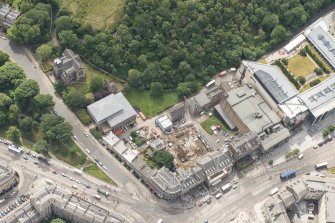 Oblique aerial view of Blenheim Place, Baxter's Place, Greenside Parish Church and Church Officer's Cottage, looking SSE.