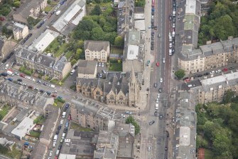 Oblique aerial view of Pilrig Dalmeny Street Church, 2,4,6 Pilrig Street, 1 Pilrig Place and Pilrig Dalmeny Street Church Hall, looking NE.