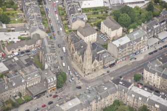 Oblique aerial view of Pilrig Dalmeny Street Church, 2,4,6 Pilrig Street, 1 Pilrig Place and Pilrig Dalmeny Street Church Hall, looking NNW.