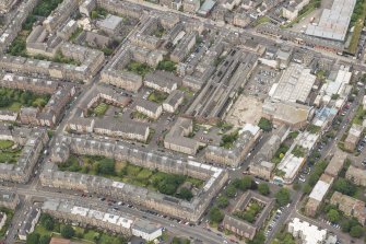 Oblique aerial view of 165 Leith Walk and 17-19 Smith's Place, looking W.