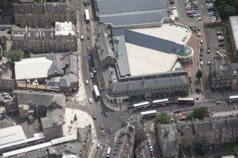 Oblique aerial view of Leith Waterworld and Leith Central Station Offices, looking ESE.