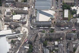 Oblique aerial view of Leith Waterworld and Leith Central Station Offices, looking E.