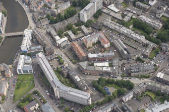 Oblique aerial view of the Black Vaults Warehouse and Cable Wynd House, looking NE.