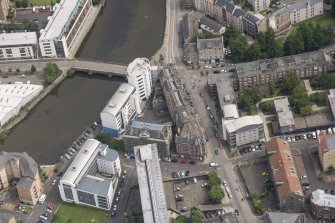 Oblique aerial view of the Black Vaults Warehouse and Cable Wynd House, looking NNE.