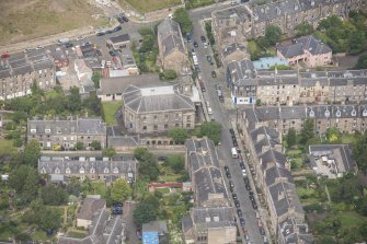 Oblique aerial view of North Leith Parish Church, Church hall and Beadle's House, looking NW.