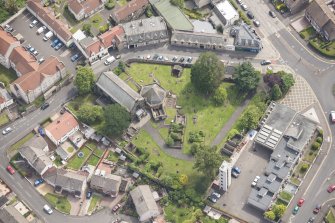 Oblique aerial view of St Triduana's Chapel, Restalrig Parish Church and Churchyard, looking ESE.