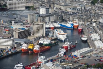 Oblique aerial view of Aberdeen Harbour, looking W.