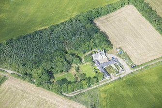 Oblique aerial view of Haddo House, steading and walled garden, looking W.