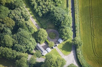 Oblique aerial view of Cairness House South Lodge, looking NNE.