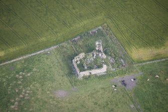 Oblique aerial view of Inverallochy Castle, looking NNW.