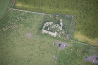 Oblique aerial view of Inverallochy Castle, looking NW.