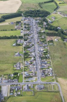 Oblique aerial view of New Aberdour, looking S.