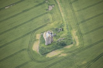 Oblique aerial view of Inchdrewer Castle, looking SE.