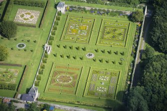 Oblique aerial view of Pitmedden House Walled Garden, looking NNW.