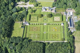 Oblique aerial view of Pitmedden House and walled garden, looking W.