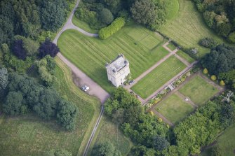 Oblique aerial view of Udny Castle and garden, looking NE.