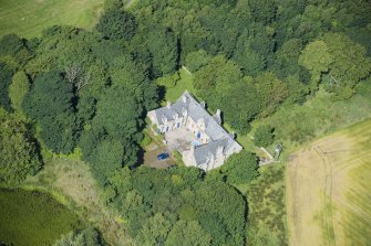 Oblique aerial view of Udny Castle stables, looking WSW.