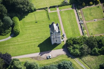 Oblique aerial view of Udny Castle and garden, looking E.