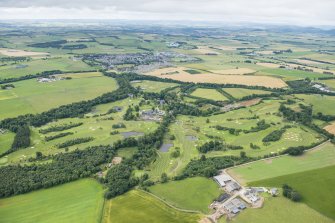 Oblique aerial view of Meldrum House Golf Course, looking SW.