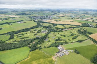 Oblique aerial view of Meldrum House Golf Course, looking S.
