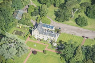 Oblique aerial view of Kirknewton House, looking NNW.