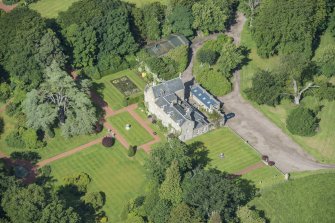 Oblique aerial view of Kirknewton House, looking WNW.