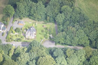 Oblique aerial view of Hatton House south entrance gates, looking NNW.
