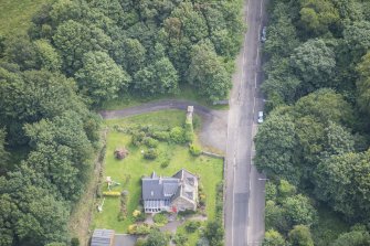 Oblique aerial view of Hatton House south entrance gates, looking ENE.
