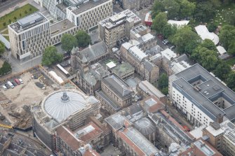 Oblique aerial view of the McEwan Hall, Unversity Student's Union, Reid School of Music and Medical School, looking SSE.