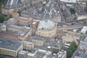 Oblique aerial view of Teviot Row House, Reid School of Music and McEwan Hall, looking NW.