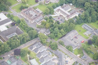 Oblique aerial view of the Astley Ainslie Hospital, looking SE.