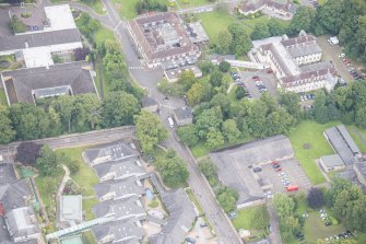 Oblique aerial view of the Astley Ainslie Hospital, looking E.