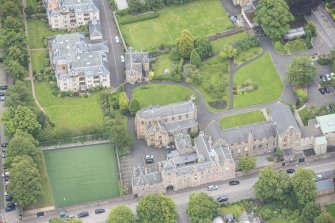 Oblique aerial view of Gillis College and St Margaret's Convent, looking E.