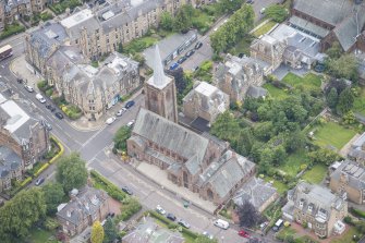 Oblique aerial view of Morningside South United Free Church, looking NW.