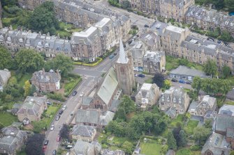 Oblique aerial view of Morningside South United Free Church, looking WSW.