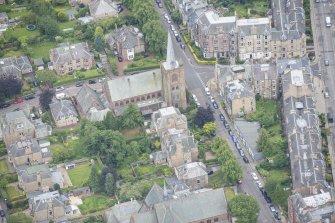 Oblique aerial view of Morningside South United Free Church, looking SSW.