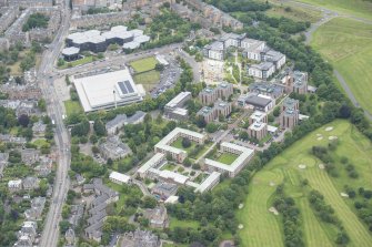Oblique aerial view of the Royal Commonwealth Pool and Pollock Halls of Residence, looking NW.
