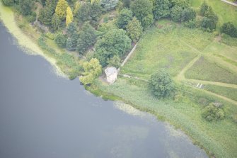 Oblique aerial view of Duddingston Manse Curling House, looking NW.