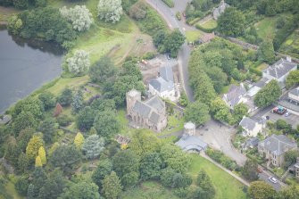 Oblique aerial view of Duddingston Parish Church, Churchyard and Watch Tower, looking WNW.