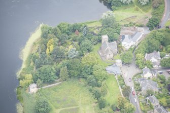 Oblique aerial view of Duddingston Parish Church, Churchyard and Watch Tower, looking WSW.