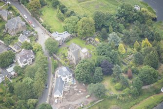 Oblique aerial view of Duddingston Parish Church, Churchyard and Watch Tower, looking ESE.