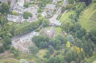 Oblique aerial view of Duddingston Parish Church, Churchyard and Watch Tower, looking ENE.