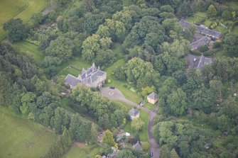 Oblique aerial view of Morton House, Garage and Walled Courtyard, looking SE.