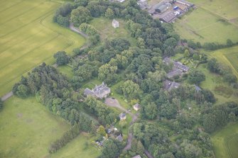 Oblique aerial view of Morton House, Garage and Walled Courtyard, looking SE.